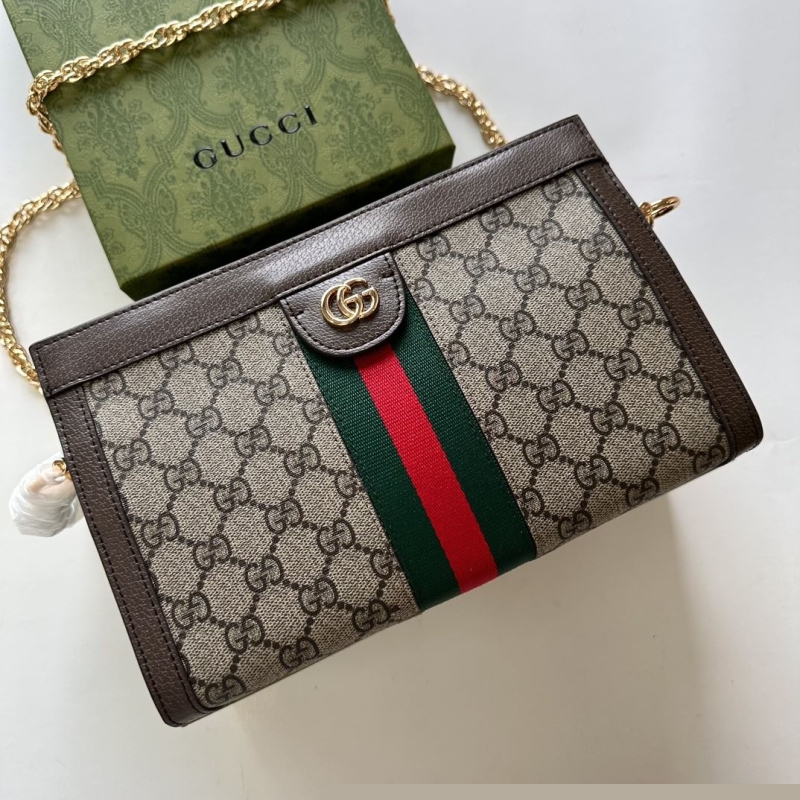 G*u*i clutch bags